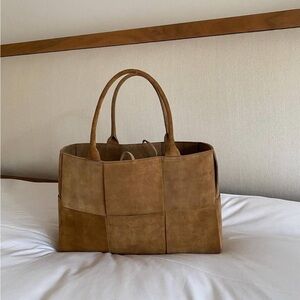 Woven suede bag bv